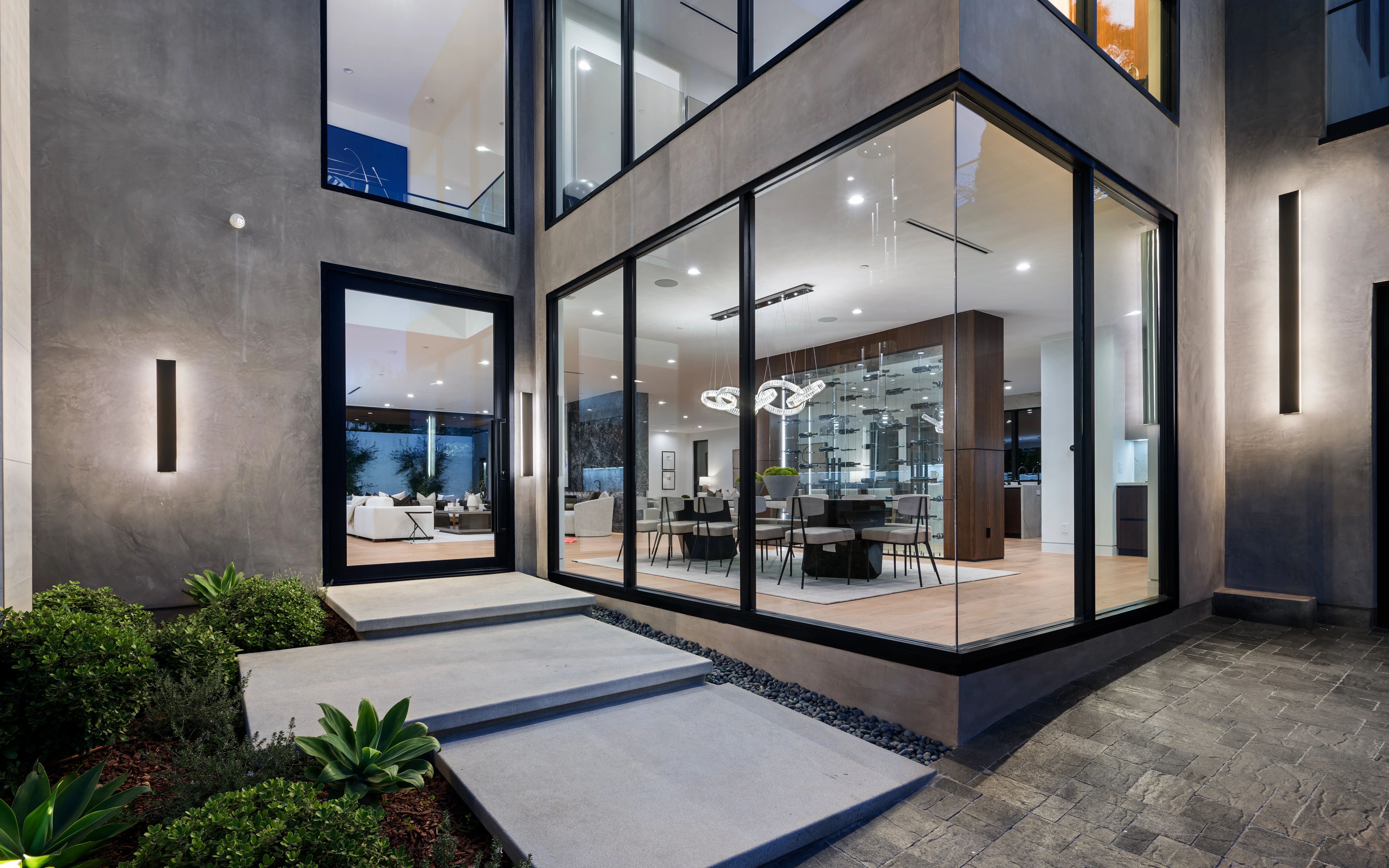 Spacious glass building with contemporary design, featuring side stairs for convenient access - How New Windows Can Instantly Upgrade Your Home - Property Charm